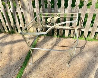 $80; Sturdy wrought iron two shelf table (glass shelves included but not pictured) Approx 30” W x 30” D x 27” H.
