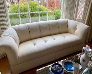 $495; Rolled arm sofa with tufted seat and back.  Upholstered in white/white fabric.  84"L x 36"D x 33"H.  Seat height 17".