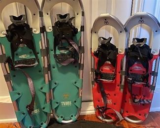 Menβs and womanβs TUBBS snow shoes.