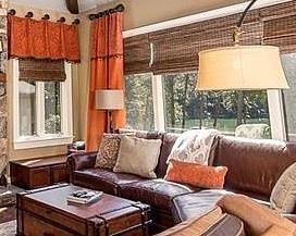 Century curved leather sofa