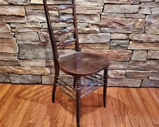 $25 - Small stature black wood chair: 37" high x 16" wide x 15" deep