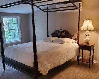$250 for bed (no mattress), $50 for stand: Canopy bed measures 80.5" at highest point x 56" at widest and 80" long. The side table is 28" high x 16" wide x 13.5" deep.