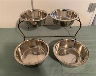 $16.00.............Raised Dog Bowls and extra stainless bowls (B552)