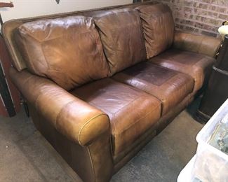 Lane leather couch! The only reason it is in the garage is because it was brought over from another home and now will be easier for someone to load into their vehicle!