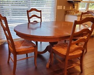 table: 31"h x 68"w x 48"d.  chairs: 43"h x 21"w x 23"d