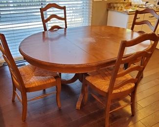 table: 31"h x 68"w x 48"d.  chairs: 43"h x 21"w x 23"d