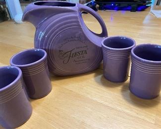 Rare lilac fiesta ware pitcher with 4 tumblers