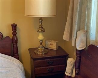 Pair of matching twin size beds with matching dresser and nightstand
