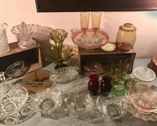 A variety of vintage glassware, vases, serving dishes, etc.
