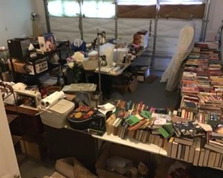 Books on the right and loads of other household items 