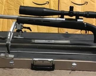 Custom Savage 223, left hand action, universal stock, 30” stainless steel fluted barrel with a 1in 7 twist, (can consistently hit a golf ball at 400 yds)