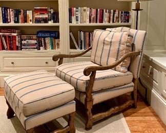 Item 91:  Carved Wood and Beige and Blue Upholstered  Arm Chair with Ottoman:  $550                                                                                         Chair - 29.25"l x 29"w x 39"h                                                               Ottoman - 28"l x 18"w x 18.5"h