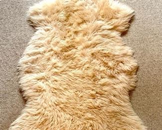 Item 138:  Furry rug - 34" x 27":  $35