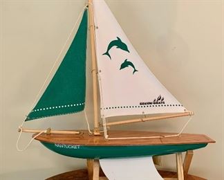 Item 144:  Bosun Boat sailboat and stand - 15" x 19":  $48