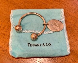 Item 218:  Tiffany & Co. keyring (this item is inscribed):  $30