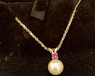 detail on pearl and ruby necklace - 