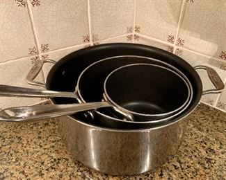 Item 427:  (3) All Clad Pans - cannot find covers - teflon interiors: $95