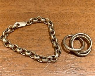 Item 336a:  Sterling silver bracelet - very small: $20   Item 336b: Tiffany & Co. Triple Rolling Sterling Ring (very small):  $55