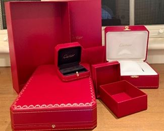 Item 313:  Lot of assorted size Cartier boxes:  $150