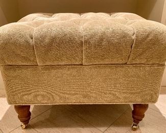 Item 452:  Upholstered ottoman with brass casters:  $165