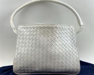 This White Woven Leather Bottega Veneta bag is available for purchase at:       https://scavengersparadiseestatesales.com