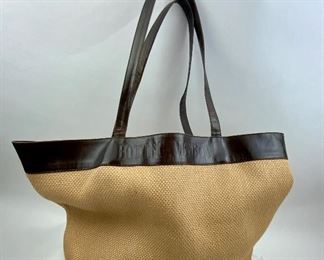 This Bottega Veneta Woven Straw w/Leather Trim bag is available for purchase at:       https://scavengersparadiseestatesales.com