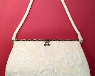 This Marguerite Fresse White Micro Beaded Floral bag is available for purchase at https://scavengersparadiseestatesales.com