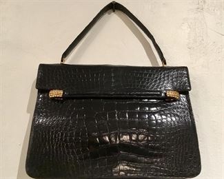 This Vintage Rendl Alligator Purse is available for purchase at https://scavengersparadiseestatesales.com