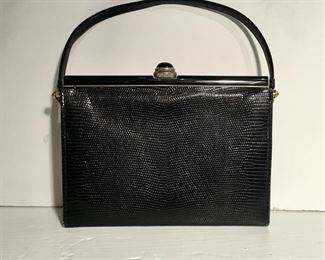 This Vintage Cerny bag is available for purchase at https://scavengersparadiseestatesales.com