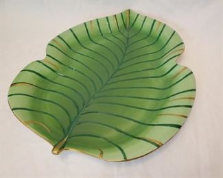 $20 - Lynn Chase 'Jaguar Jungle' Handpainted Banana Leaf Platter - A large banana leaf platter with 24K gold trim from the 'Jaguar Jungle' pattern by Lynn Chase Designs. The platter is 16" x 13.5" and has a couple of chips to the paint on the front side.