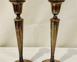 $60 - Sterling silver weighted tall candlesticks.  9.5” H; Base 3.75”