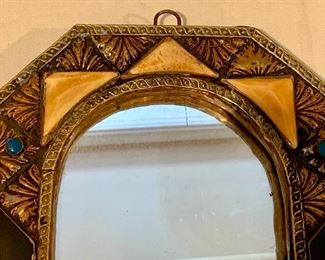 Detail; inlaid stone mirror