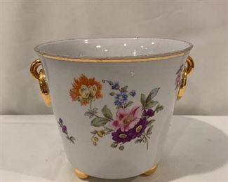 $40; Freiberger porcelain floral footed cachepot with gold trim;6.5” H x 7.5” D