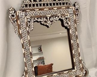 $50; Inlaid wood framed mirror; 25” H x 17.5” W; as is. (Top needs to be reattached)