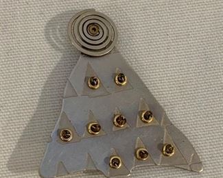 $25; Artisan made silver tone Christmas tree pin.  Approx 2” H