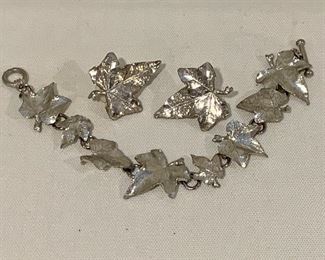 $60; Maurice Milleur handcrafted pewter Ivy earrings and bracelet; signed; Earrings approx 1.5: long, surgical steel post.