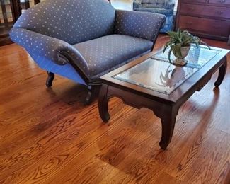 Antique sofa and beautiful glass-top coffee table