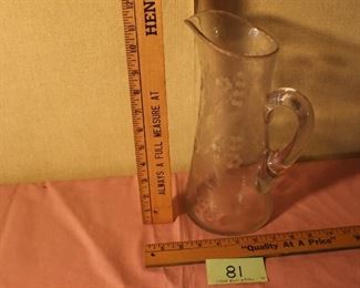 81 - Glass pitcher $10, etched 11" exc
