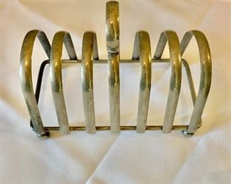 $10 - Vintage silverplate toast rack; made in England; two available; 4 1/2 in. (H) x 5 1/2 in. (L) x 3 in. (depth)