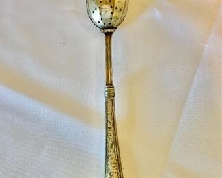 $20 - Tea infuser with sterling handle #1; approx. 7  in. (L, overall) x 3 1/2 in. (L, handle)