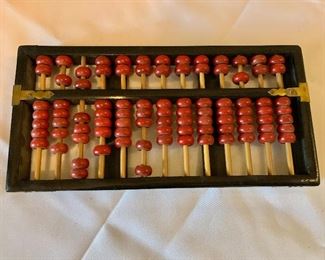 $20 - Wooden abacus; 4 3/4 in. (W) x  9 1/2 in. (L)