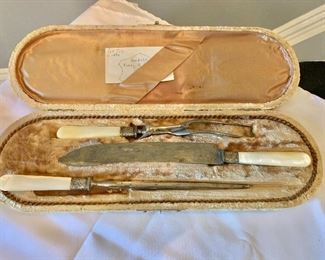 $50 - Vintage carving set with mother of pearl handles in box; case 17 in. (L) x 5 1/2 (W); carving blade of knife 5 in. 