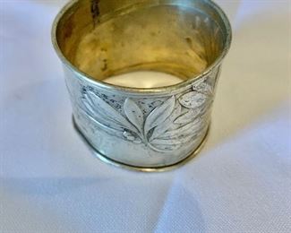 $20;  Silver (800) napkin ring; 1 1/2 in. (W) x 2 in. (diameter)