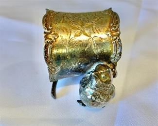 $50;  Vintage bird and wishbone napkin ring; engraved "Alma Renee"; unmarked