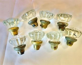$40 - Eight glass door knobs with brass base, some with small flecks of paint; 2 in. (handle diameter)