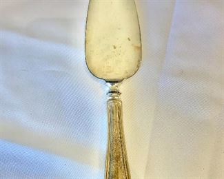 $25 - Cake server with sterling handle; 10 in. (L)