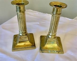 $20 - Pair brass candlesticks; 6 in. (H) x 3 in. (square base)