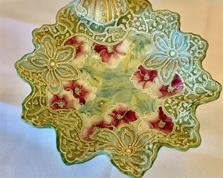 $20 - Vintage handpainted ceramic dish with scroll handle; 2 1/2 in. H) x 6 1/ 2 in. (diameter)