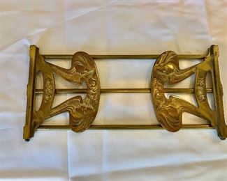 $30 - Art nouveau brass expandable book stand; 4 1/2 in. (H, with sides up) x 12 1/4 in. (L, at baseline) x 5 in. (W)