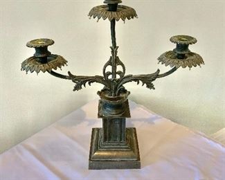 $40; Three armed metallic candelabra; 15 in. (H) x 15 in. (W) x 5 in. (square base)